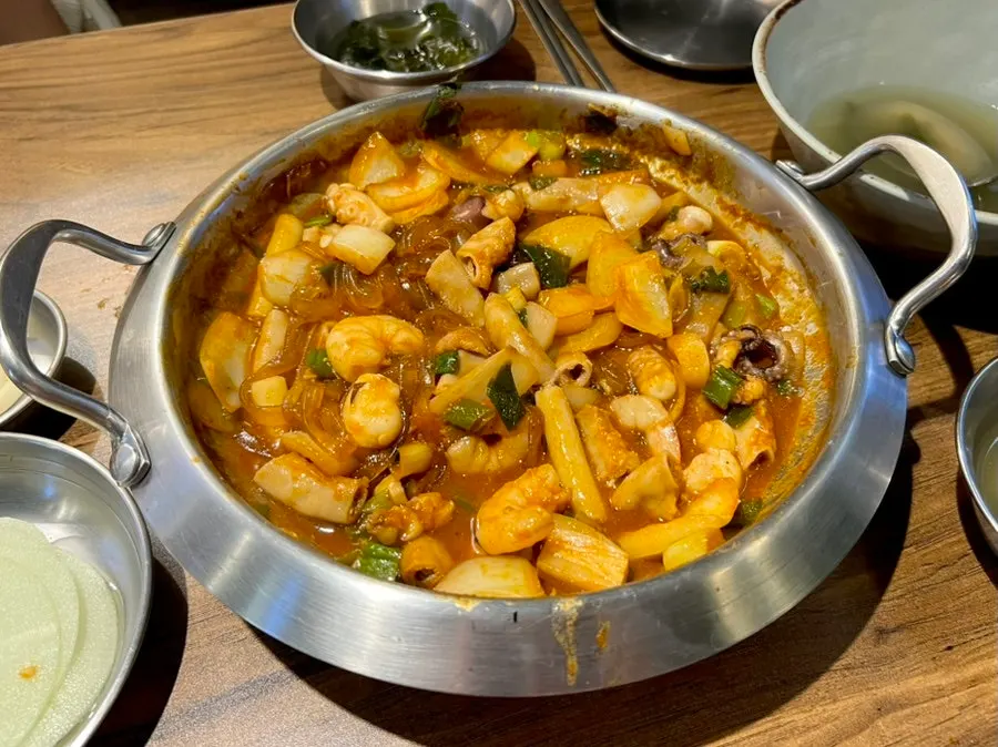 A chopstick's worth of beef intestine coated in sauce