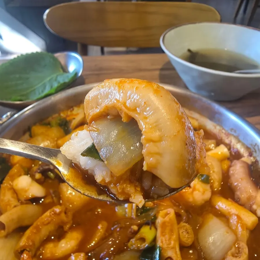 Octopus, tripe, and shrimp piled on top of rice