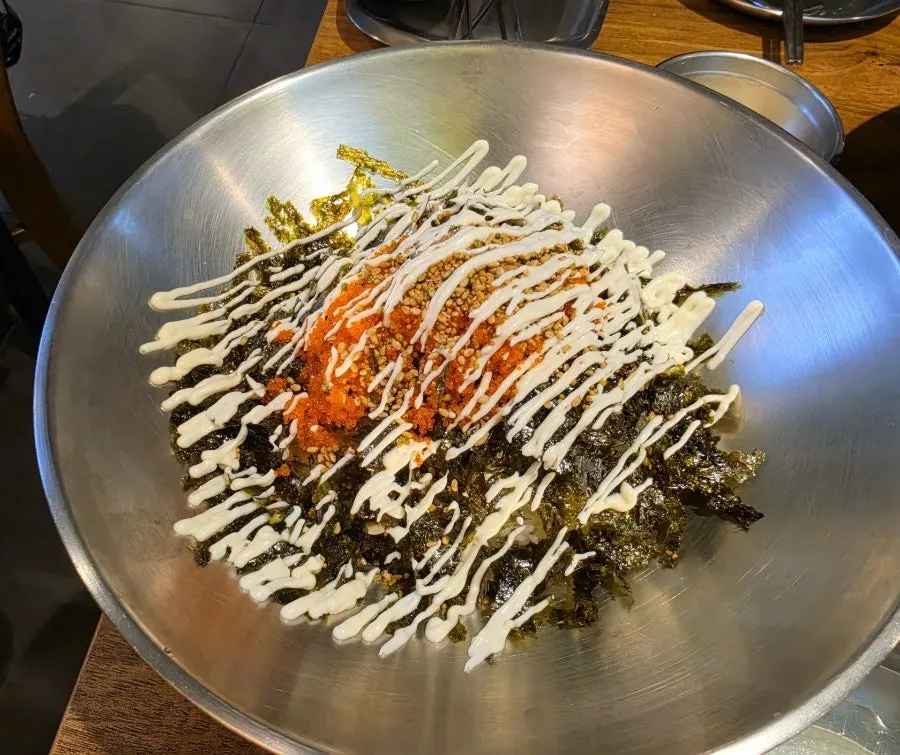 Pot of nakwoosae with big shrimp and octopus