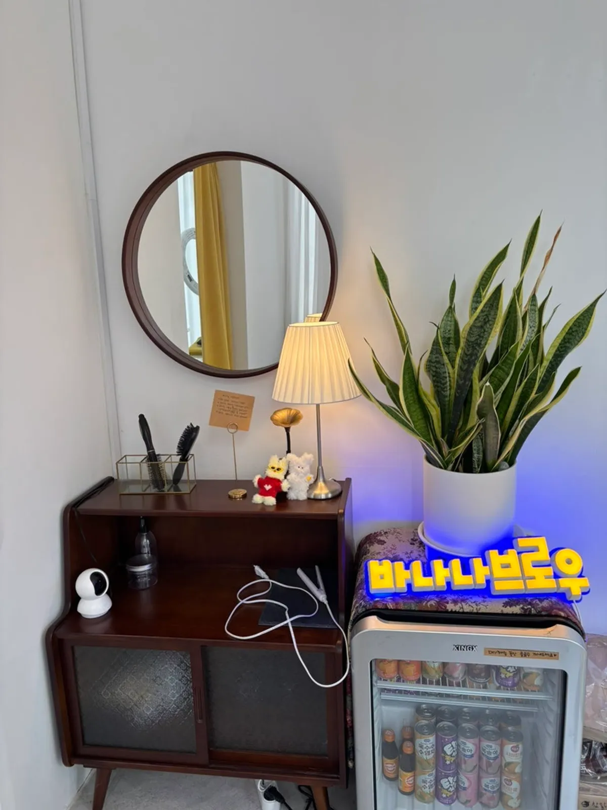 Banana Brow sign and drink fridge