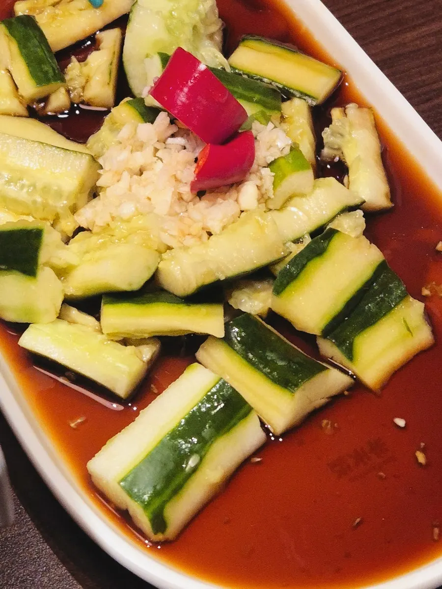 A plate of cucumber salad given as a receipt review perk