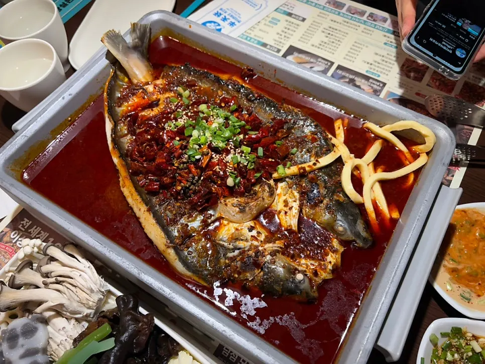 Level 1 mala kaoyu topped with plenty of chili peppers