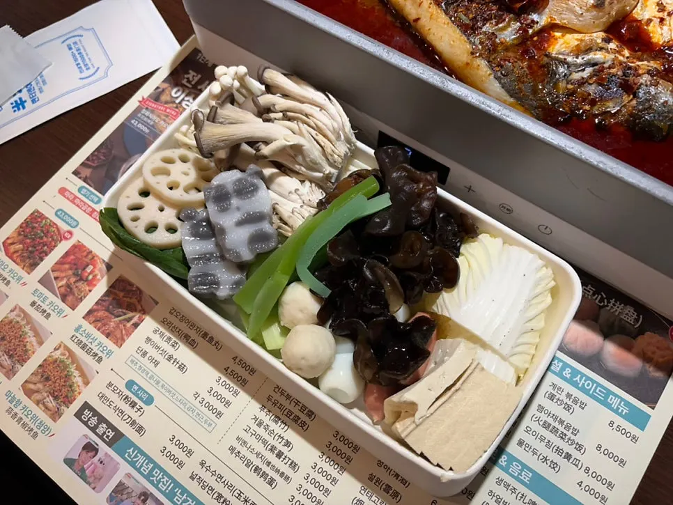 Kaoyu pot filled with large ningbo fish pieces