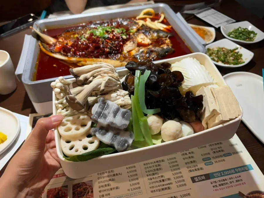 Sarigi with fish balls, lotus root, and panda fensi