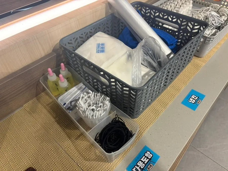 Restaurant amenities including floss and hair ties