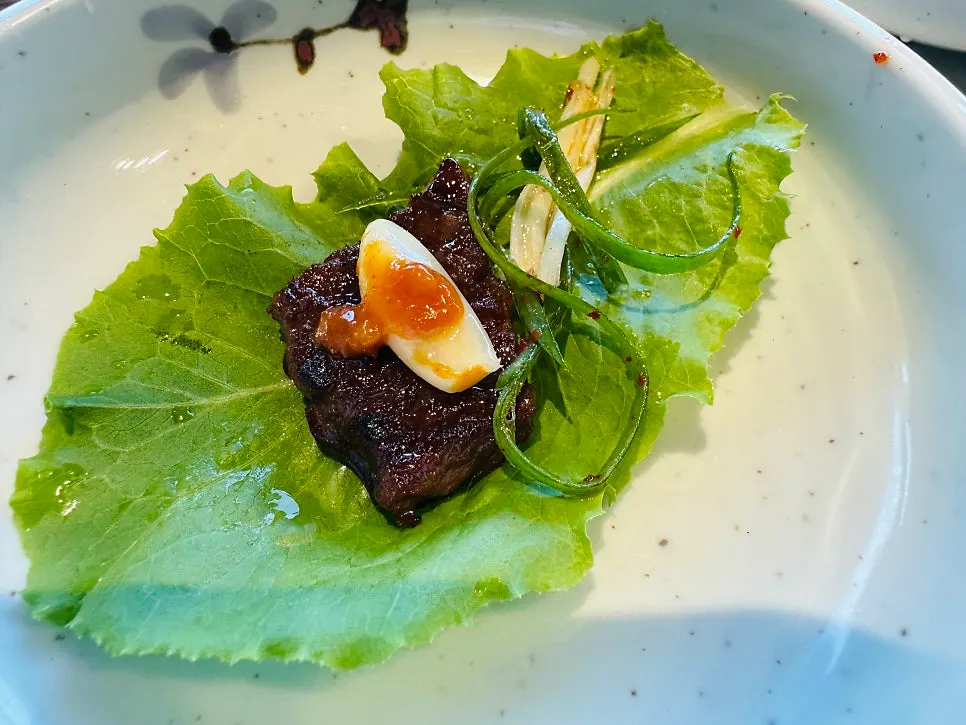 Marinated beef short ribs with ssam vegetables