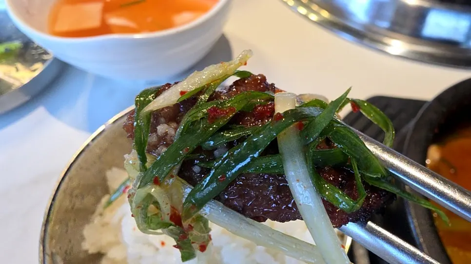 Marinated beef short ribs and green onion kimchi