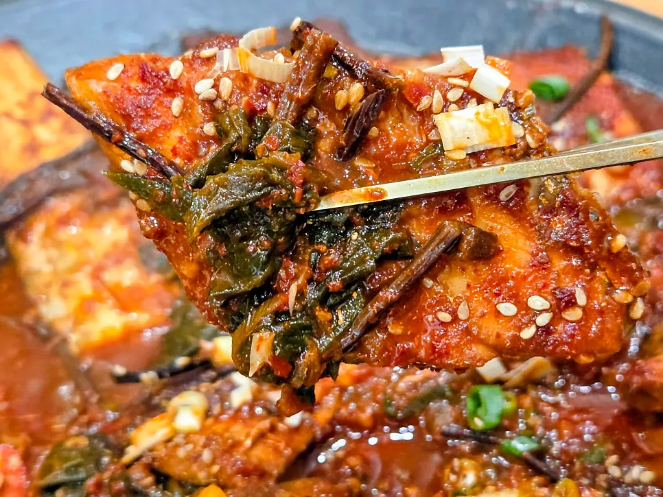 Sauce-soaked radish inside the hairtail stew