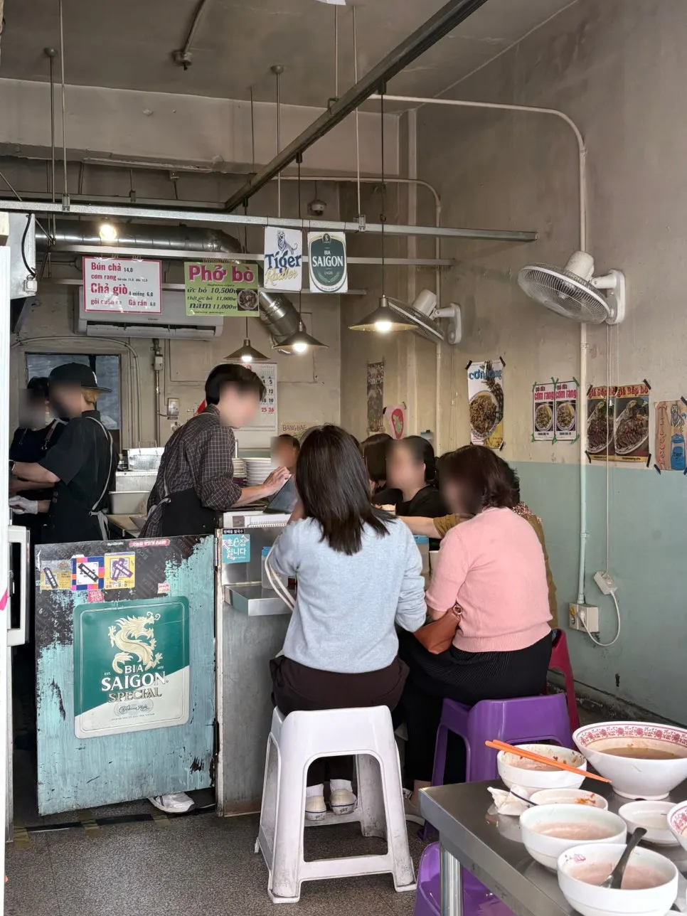 Entrance of Bangbaedong Ssalguksu with an authentic Vietnamese feel