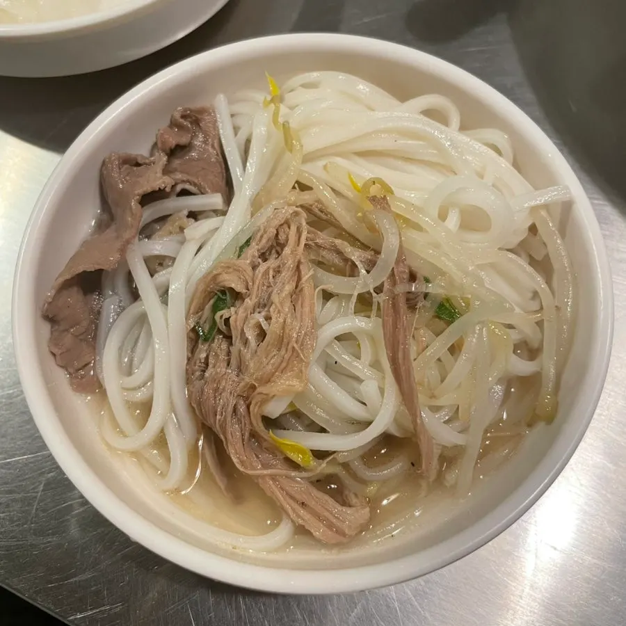 Pho topped with brisket, tenderloin, and flank