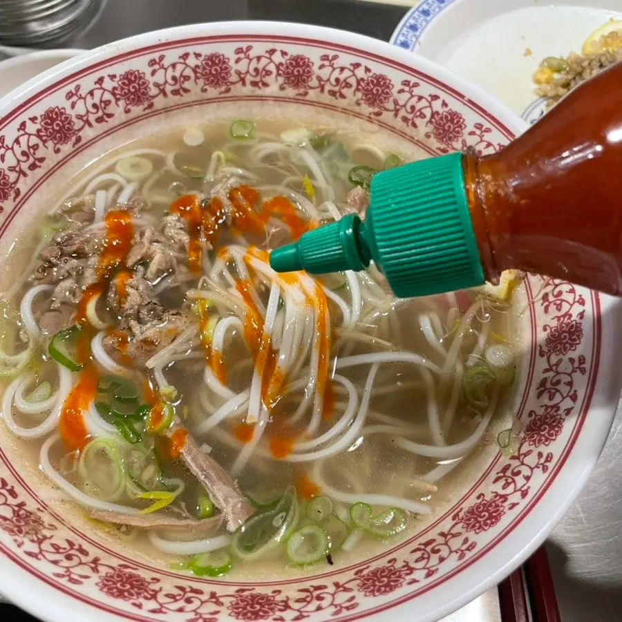 Pho served in a small side plate