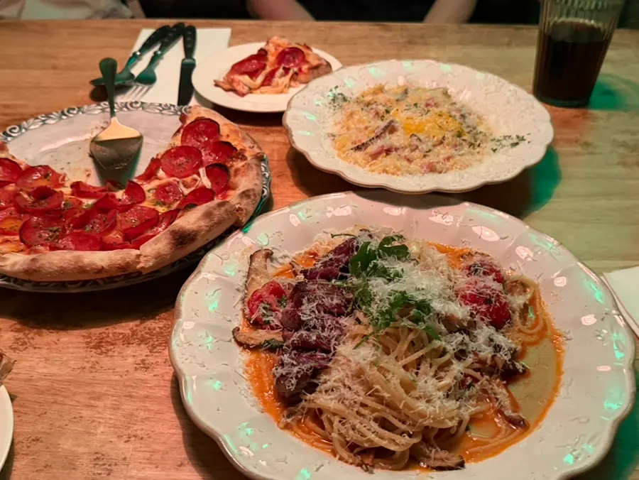 Pasta and risotto served with pizza