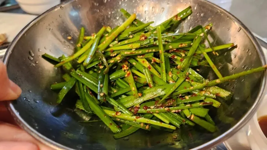 Minari-based pickle sauce served at Jinseong Hanwoo Gopchang