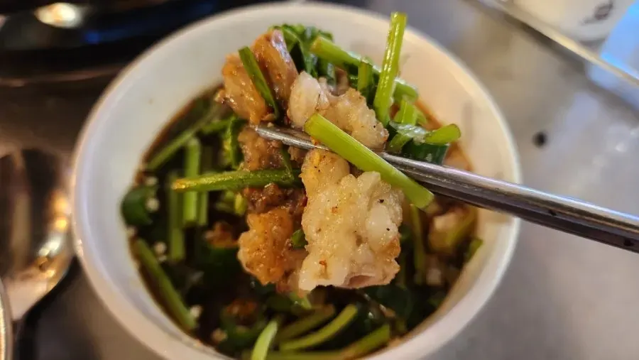 Grilled gopchang with minari-garlic pickle sauce