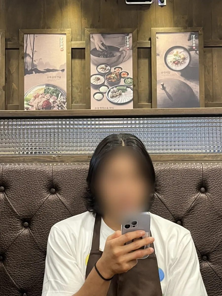 Glass of zero cola prepared alongside the gukbap