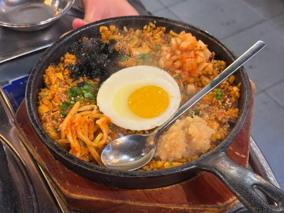 Gopchang and daechang cooking on the hot plate