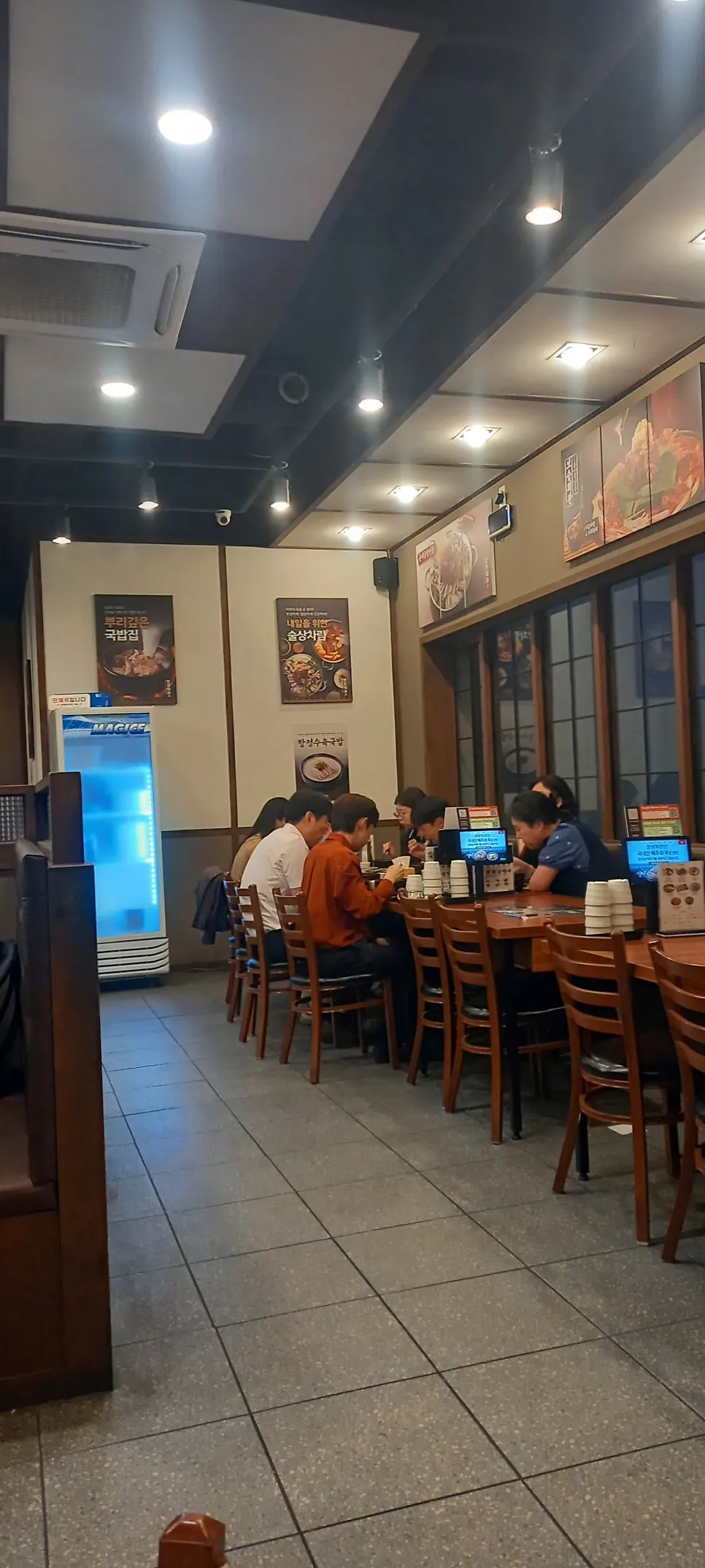 Spicy sundae gukbap and pork gukbap placed side by side on the table