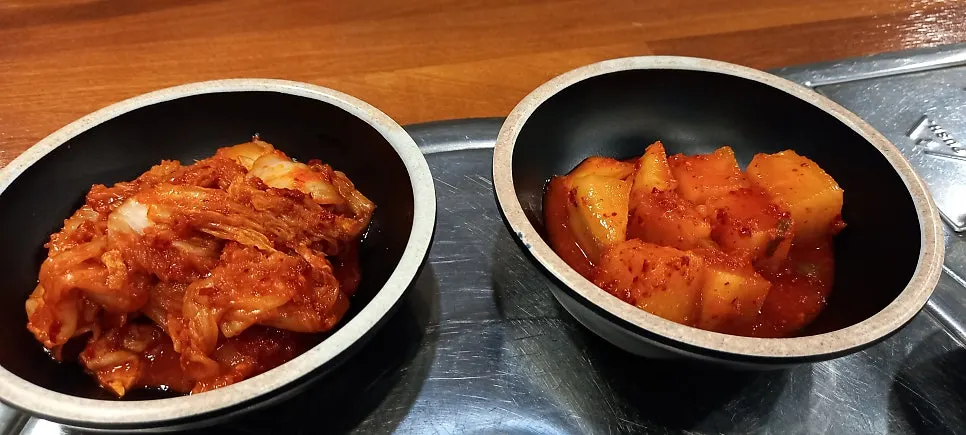 Ordering gukbap and side dishes on the tablet screen