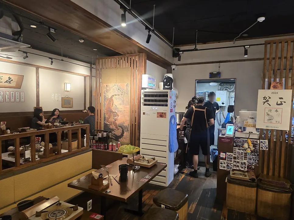 Table spread with gopchang hot pot