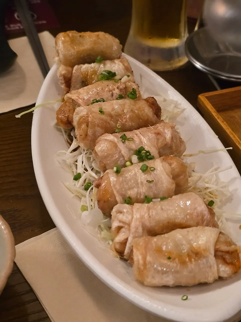 Close-up of tofu and gopchang in the hot pot