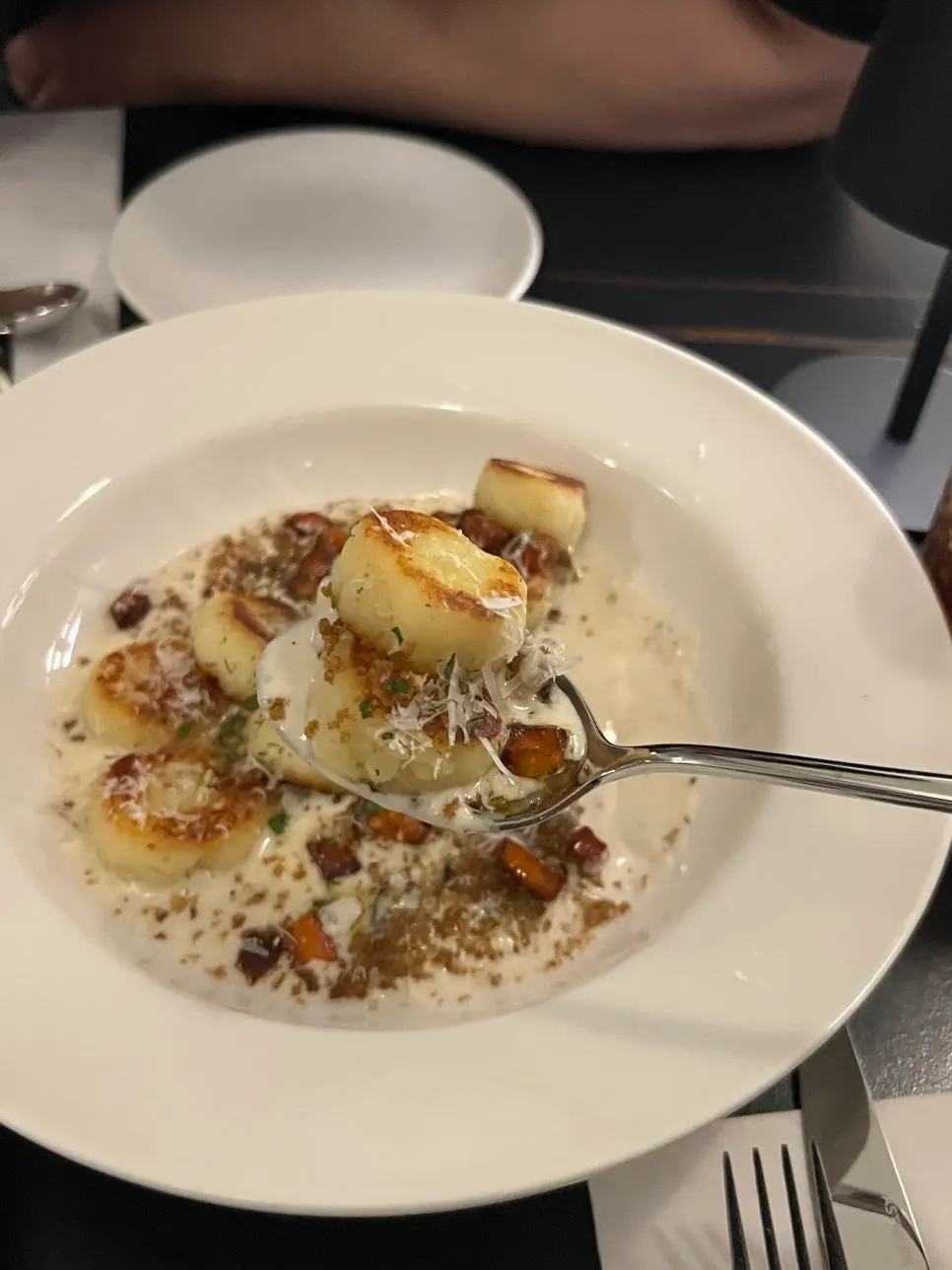 Handmade potato gnocchi topped with mushroom cream