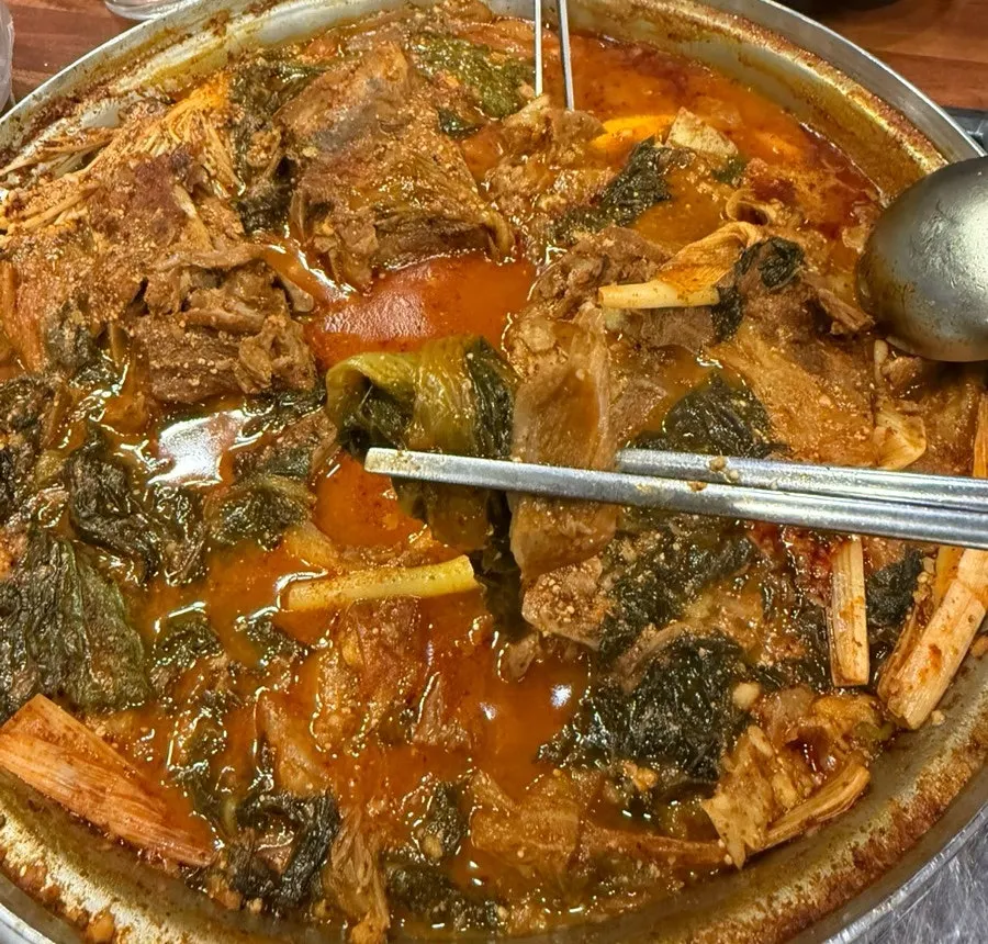 The bone gamjatang table near the end of the meal