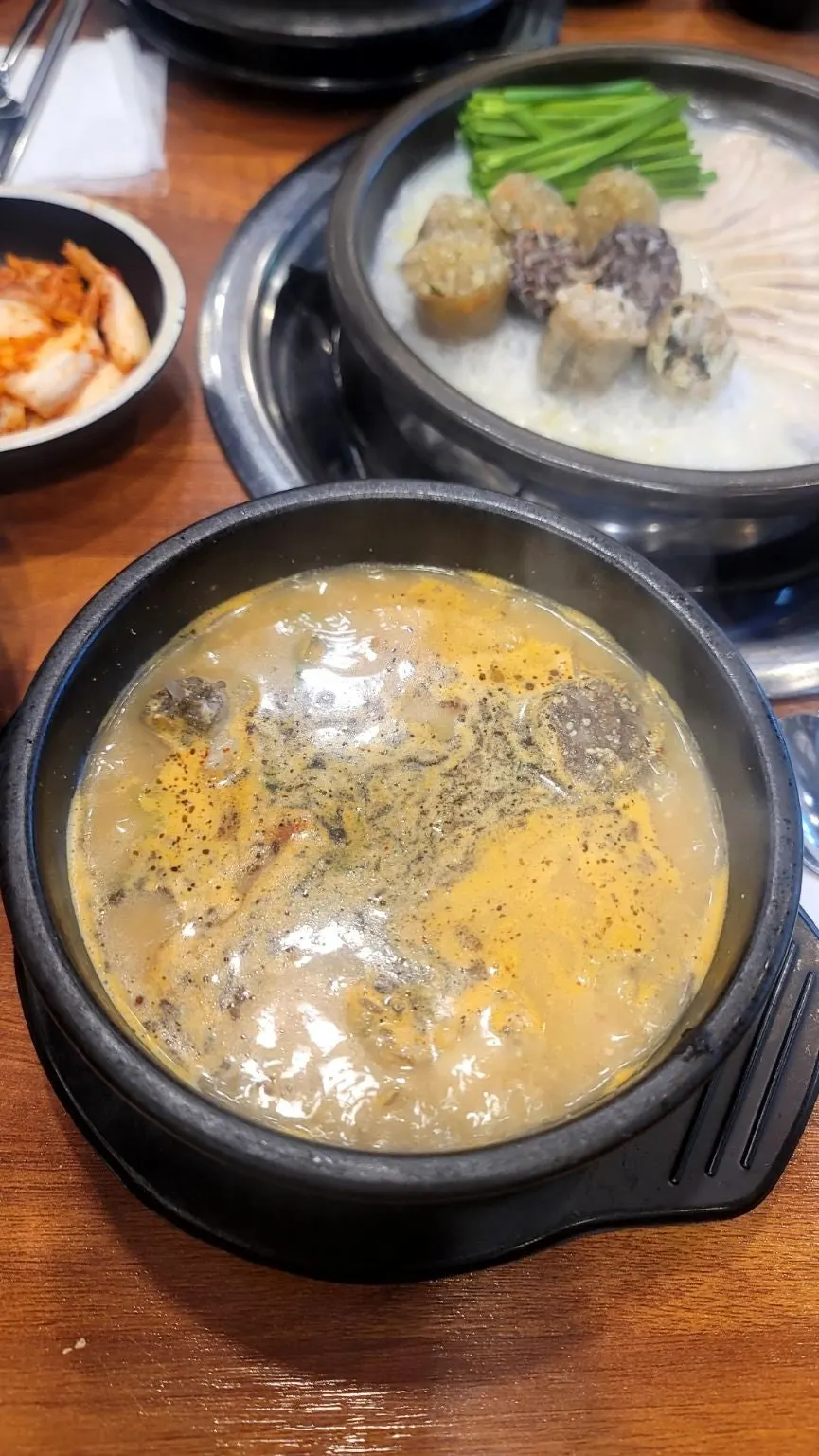 Close-up of gukbap topped with perilla powder