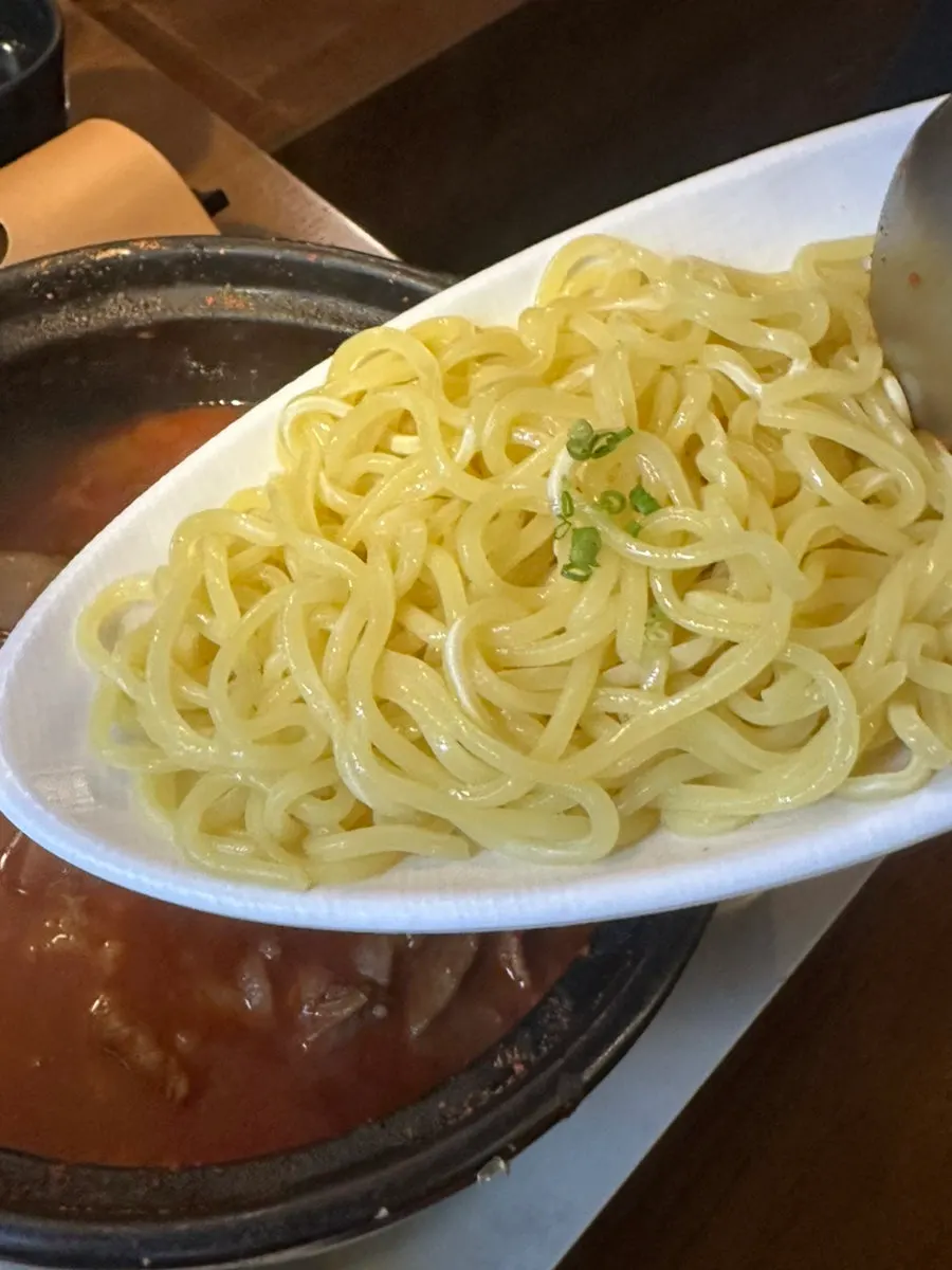Jjambbong noodle add-on dropped into the leftover broth