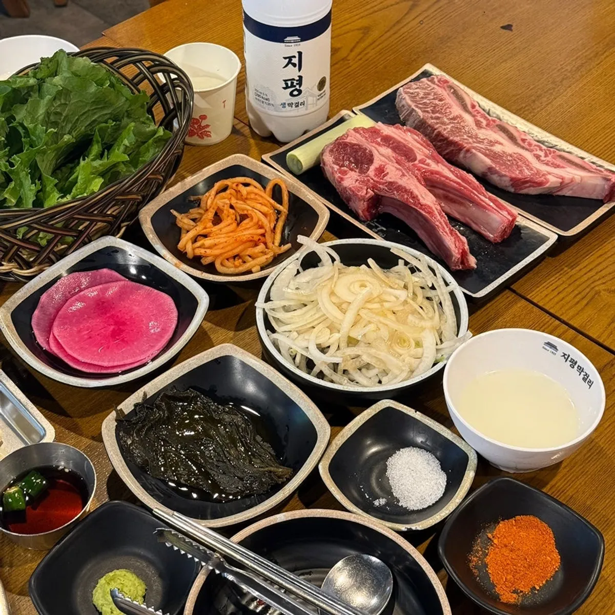 Snowflake galbi and lamb ribs grilled over charcoal at Dangsan Odol Bangi Branch