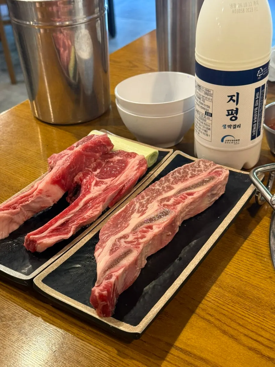 Jipyeong raw makgeolli ordered alongside the meat