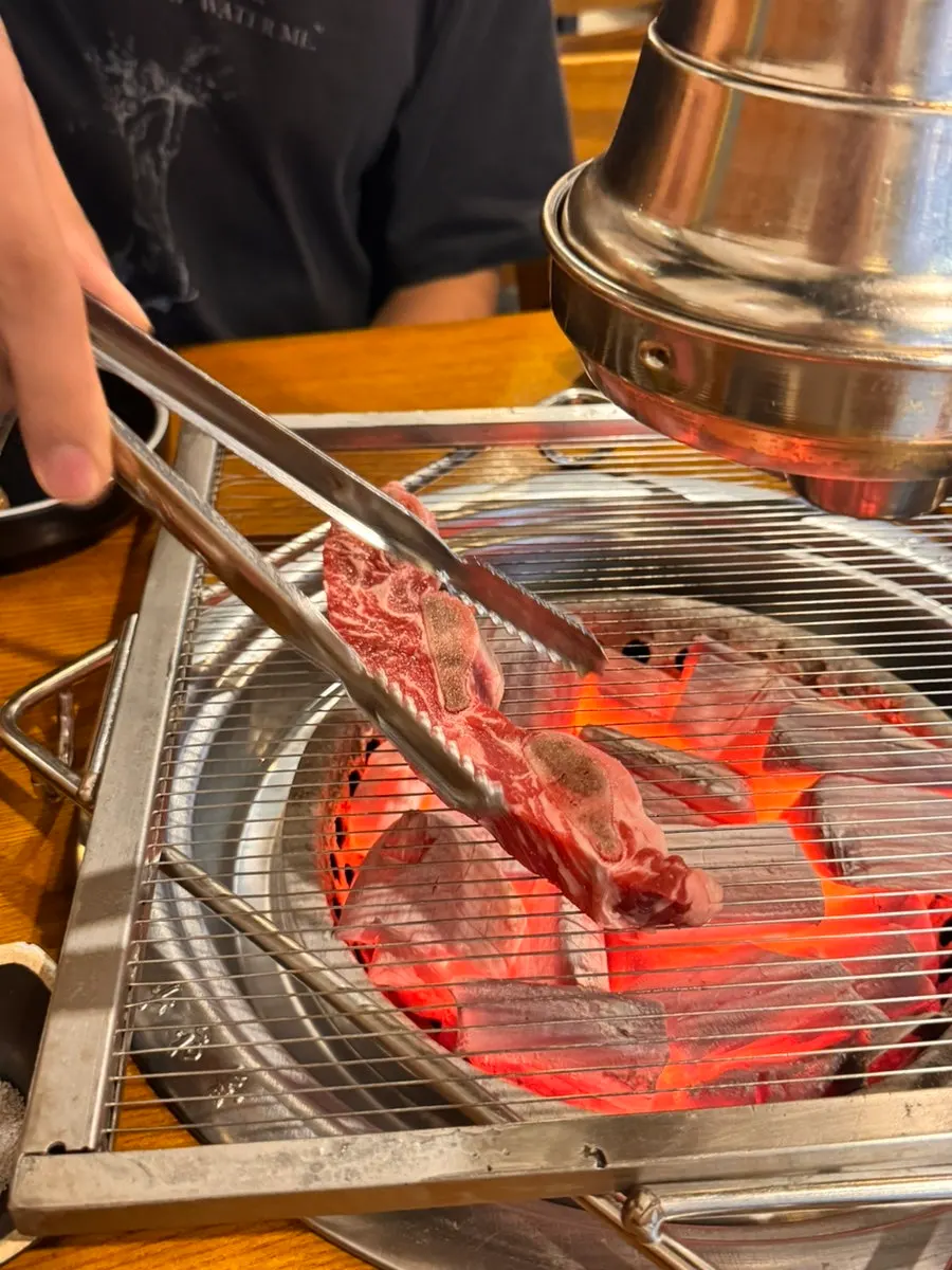 Charcoal grill set up at the table