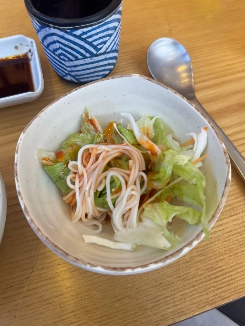Gochujang-vinegar based salad with somyeon noodles underneath