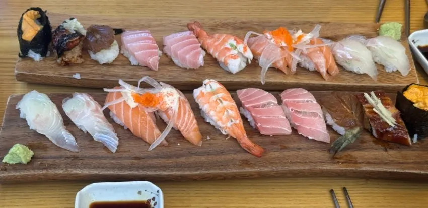 Wide shot of the sushi plate split into sections