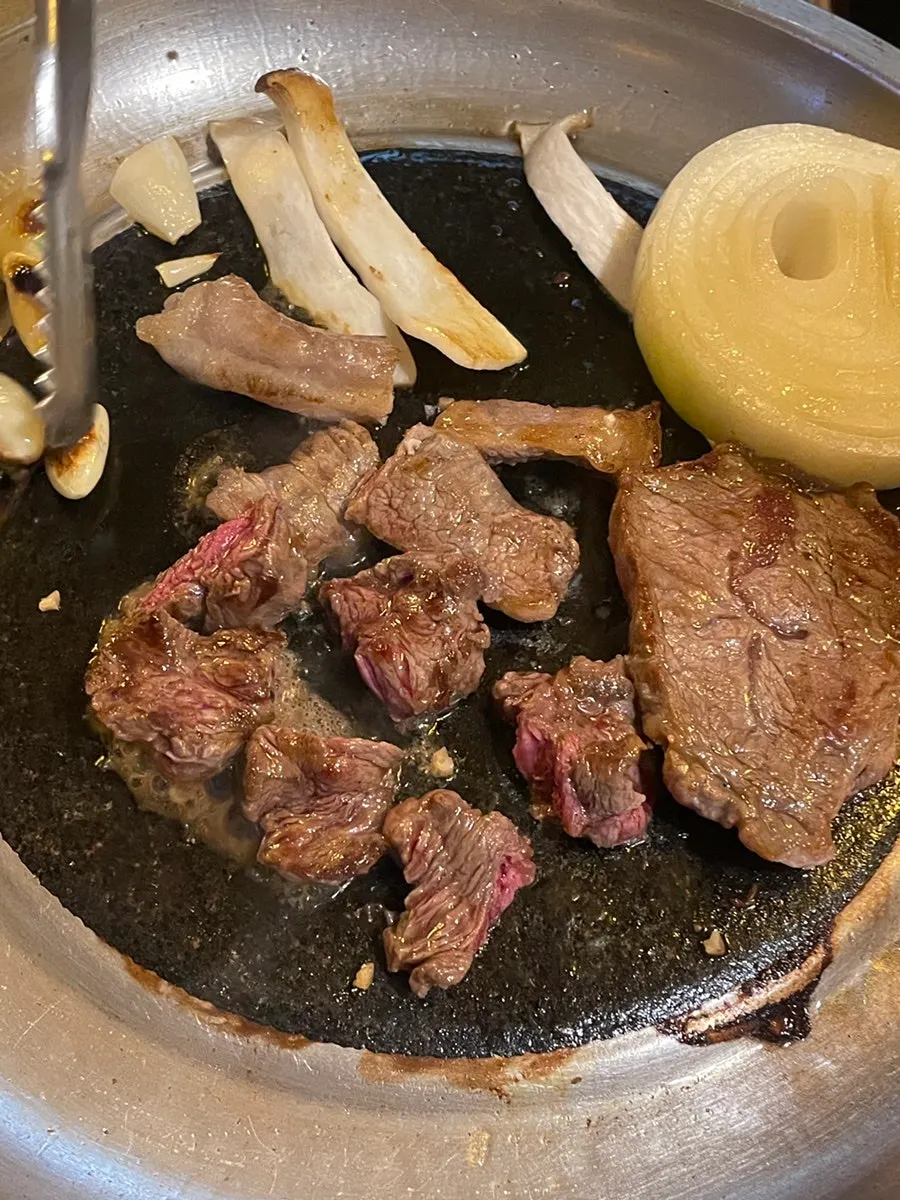 Korean beef specialty cuts cooking on the grill