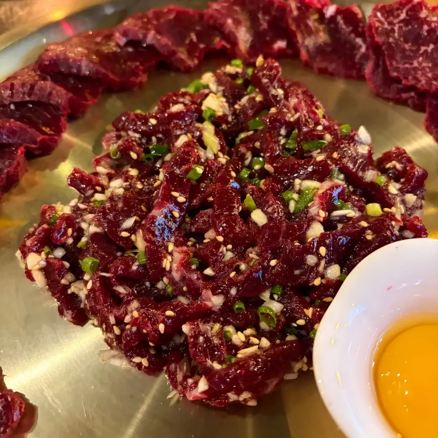 Yukhoe mixed with raw egg on top