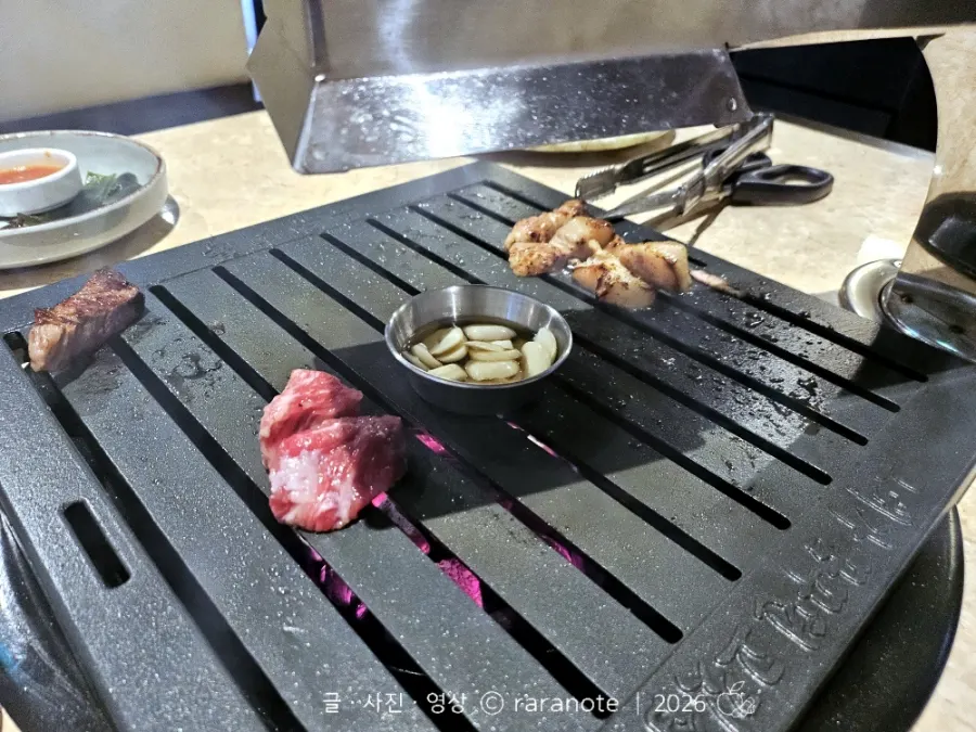 Hanwoo 1++ sirloin being grilled