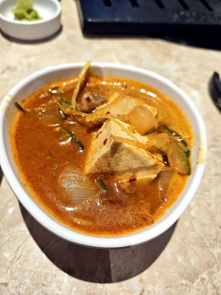 Doenjang jjigae eaten alongside the meat