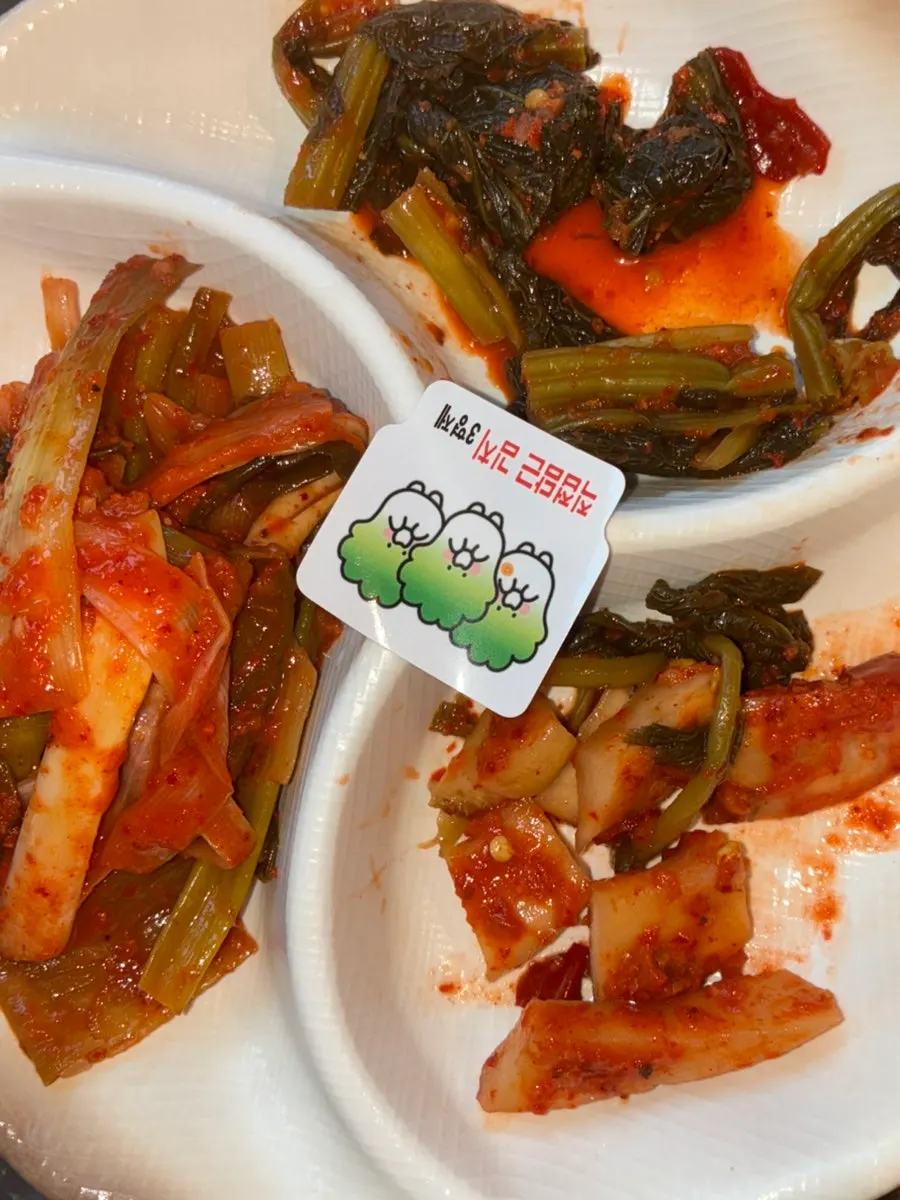 House-made kkakdugi served as a complimentary side
