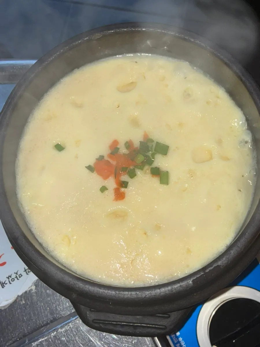 Soy dipping sauce with minari and Cheongyang chili peppers
