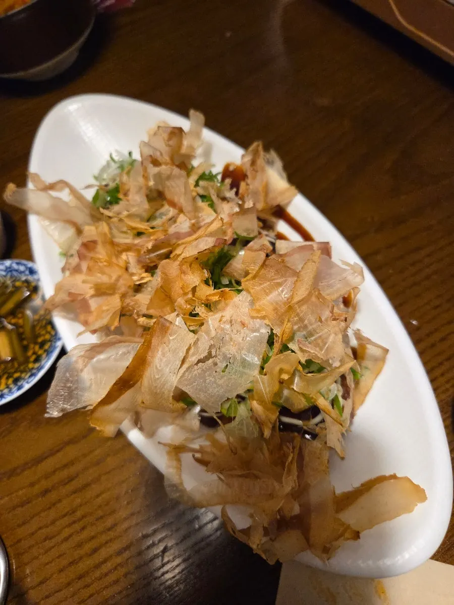 Takoyaki topped with bonito flakes