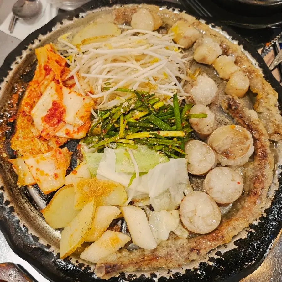 Cut and cooked Korean beef daechang and gopchang