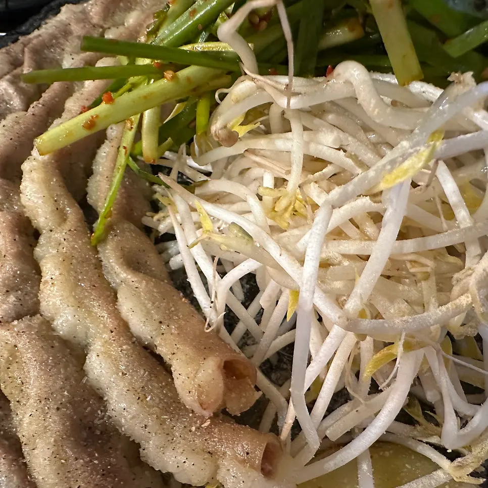 Par-grilled hanwoo gopchang being prepared