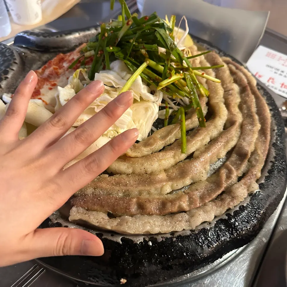 Hanwoo gopchang placed on the grill