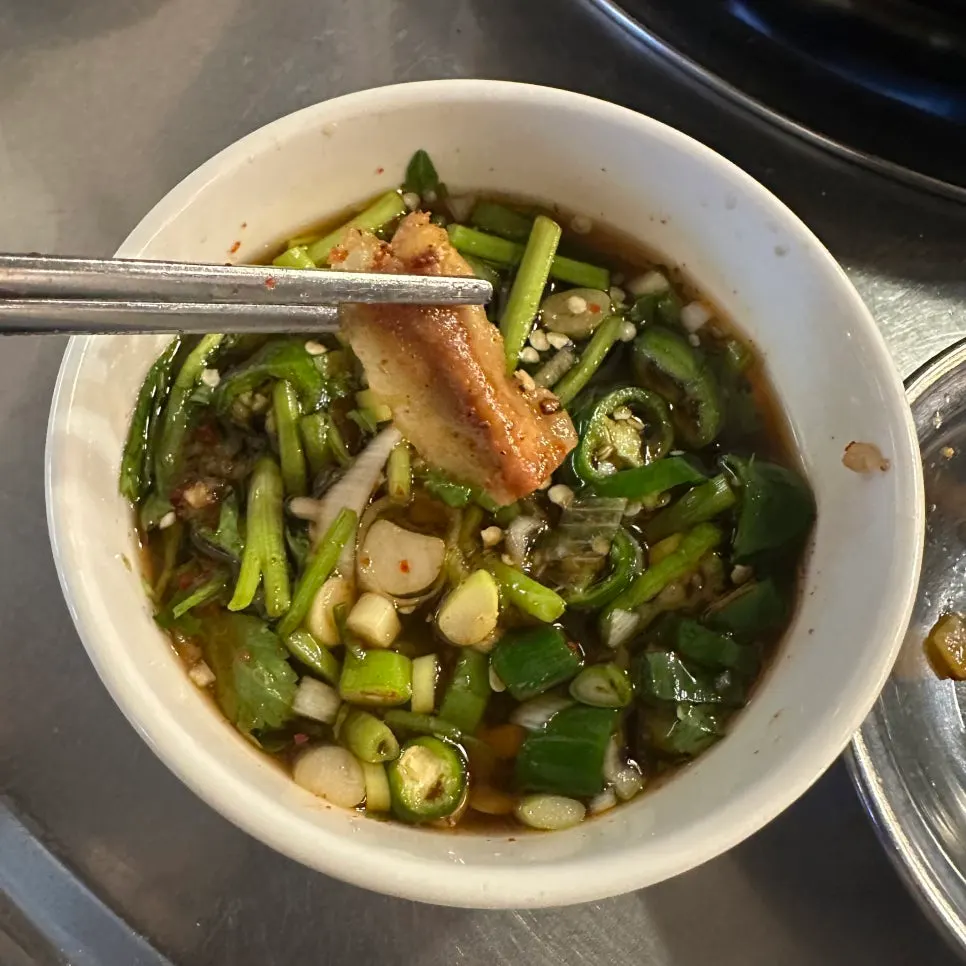Gopchang with bean sprouts and chives