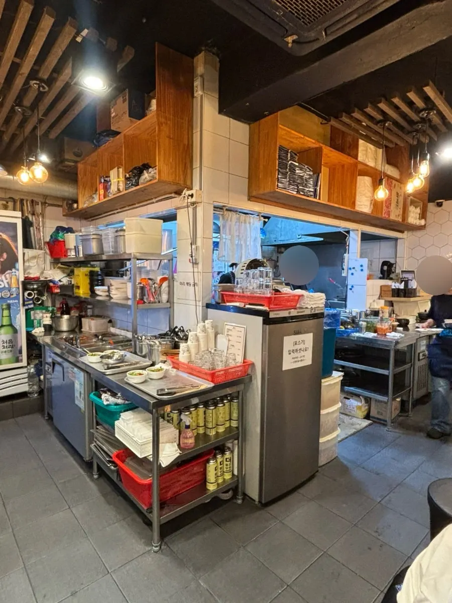 Indoor seating with outdoor-pocha atmosphere on Bangi food alley