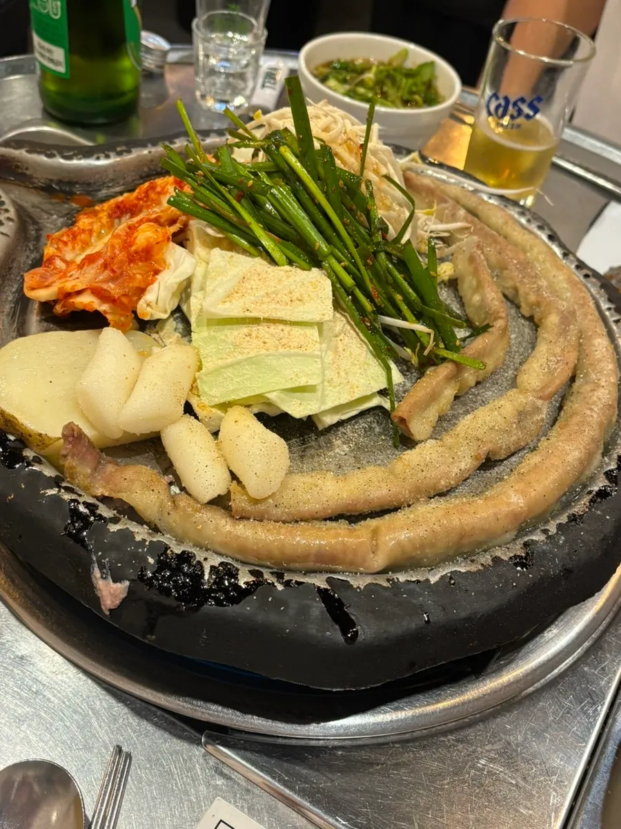 Kimchi side dishes served with gopchang