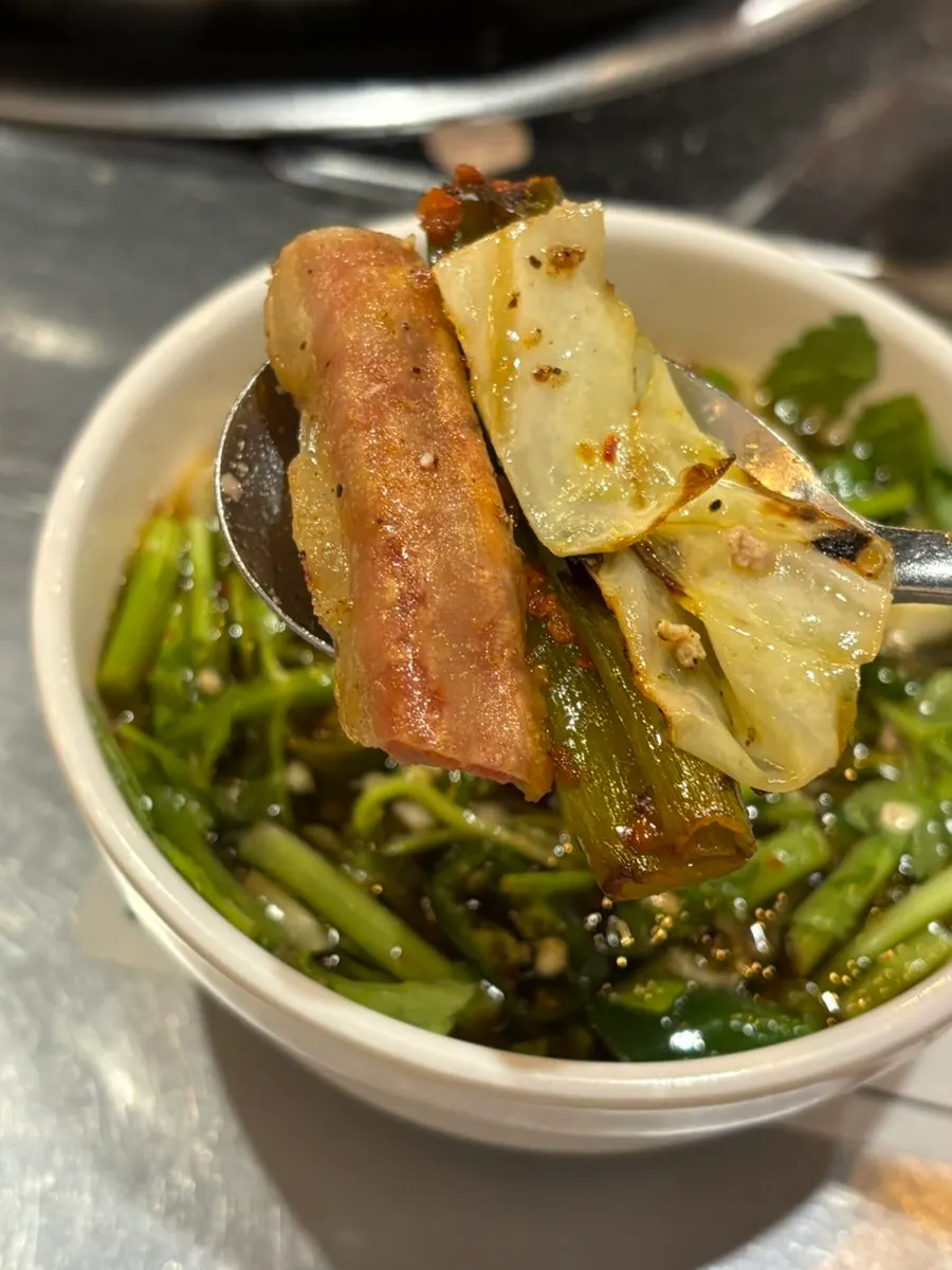 House sauce made with minari and pickled garlic