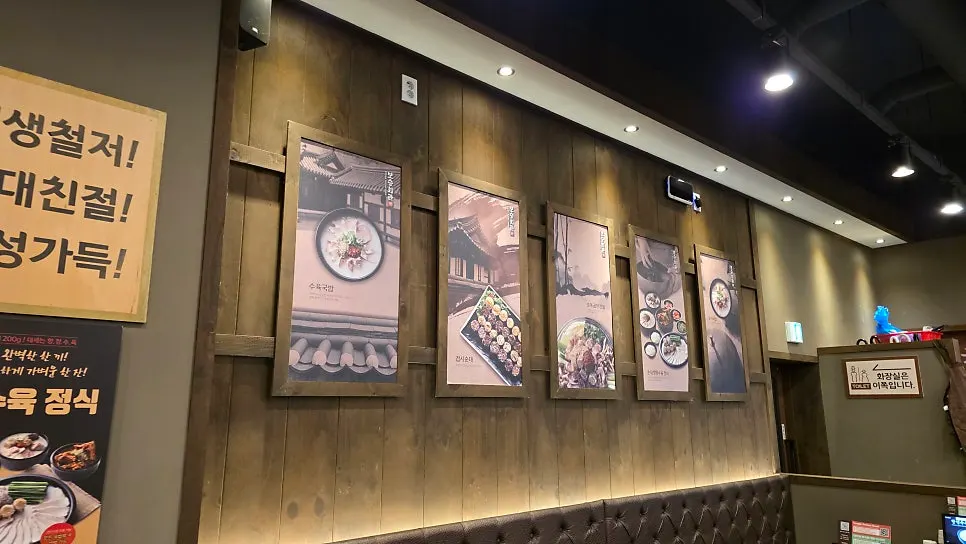 Restaurant interior with wood-toned tables