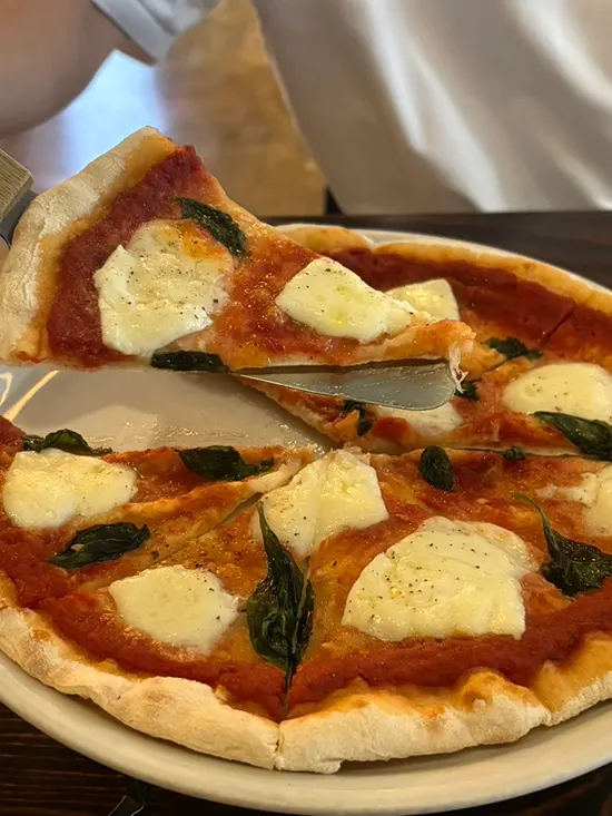 Signature Margherita pizza