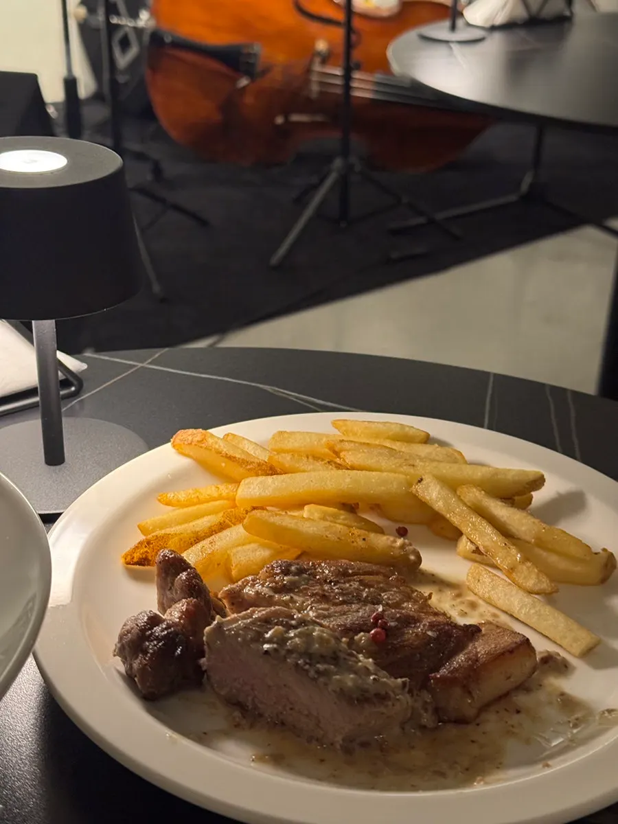 Pork steak served with fries